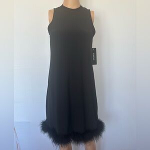 bebe Black Sleeveless Mini Dress with Feather Hem